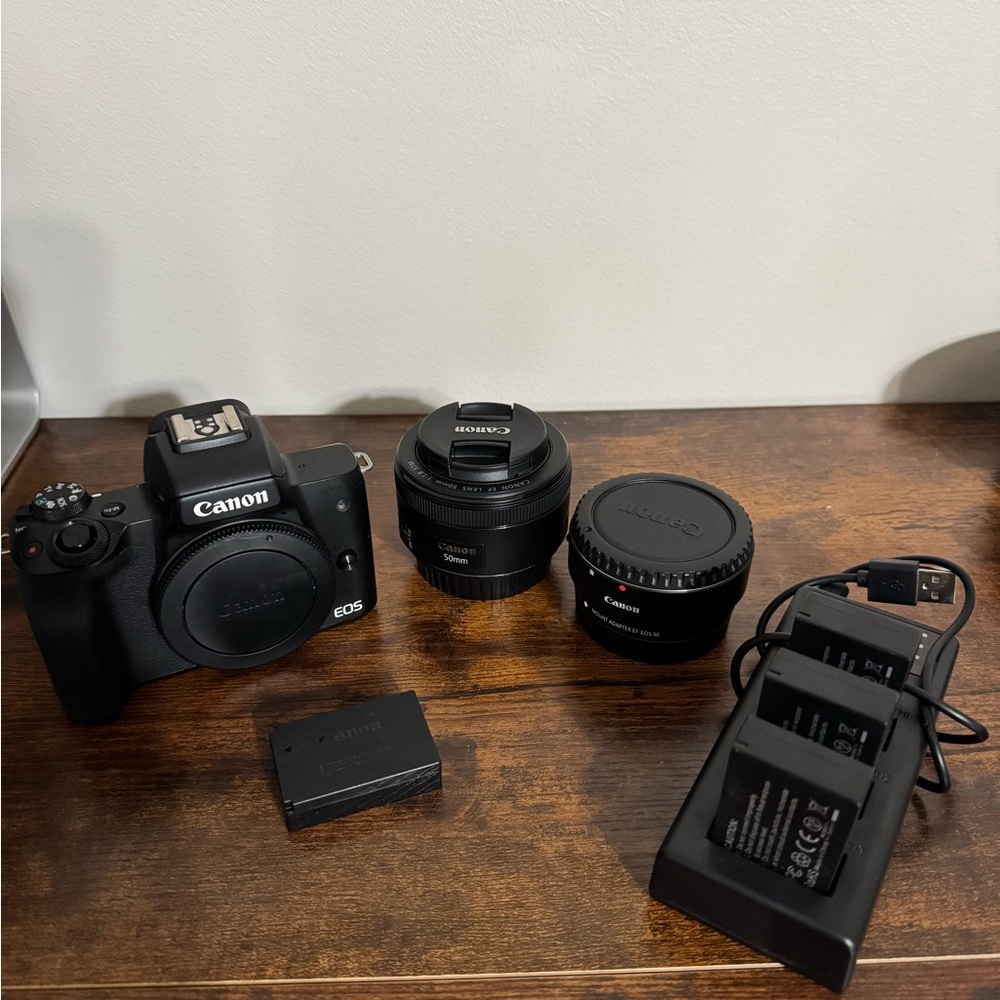 Canon EOS Black Camera with Dual Lenses